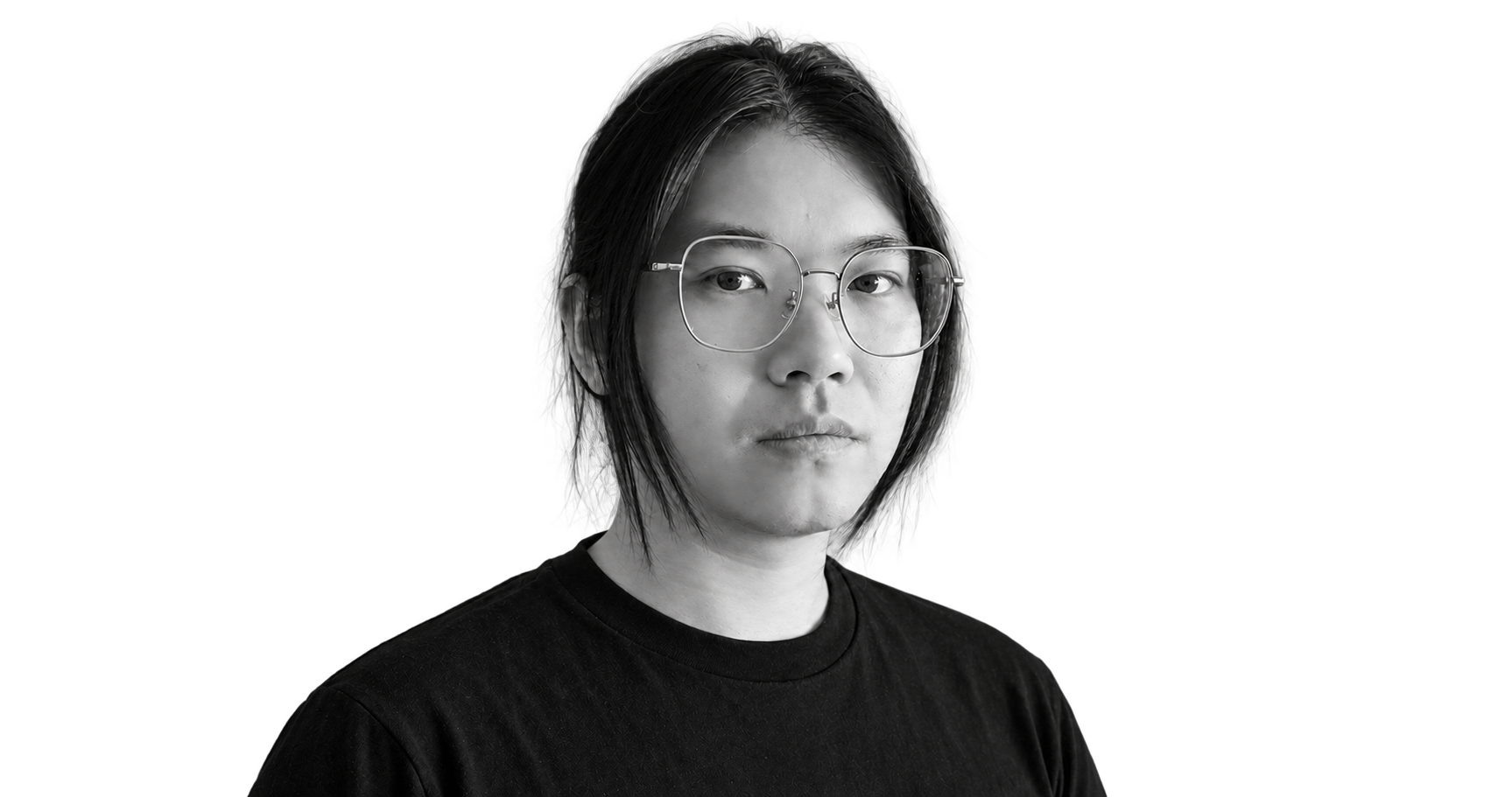 Black-and-white portrait of Xudong Xing